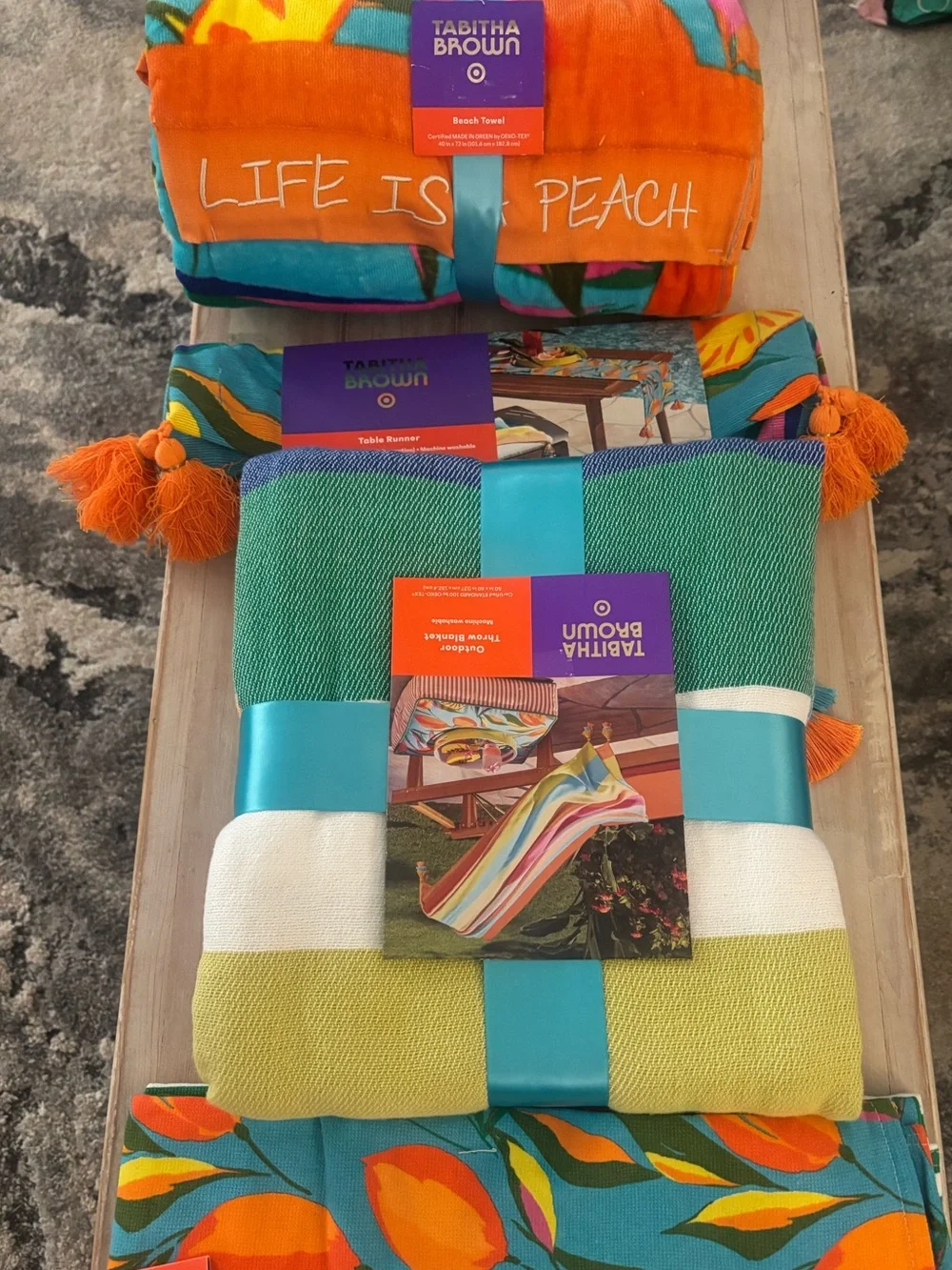 TabithaBrownCollection includes kitchen towels,outdoor throw, table runner,towel